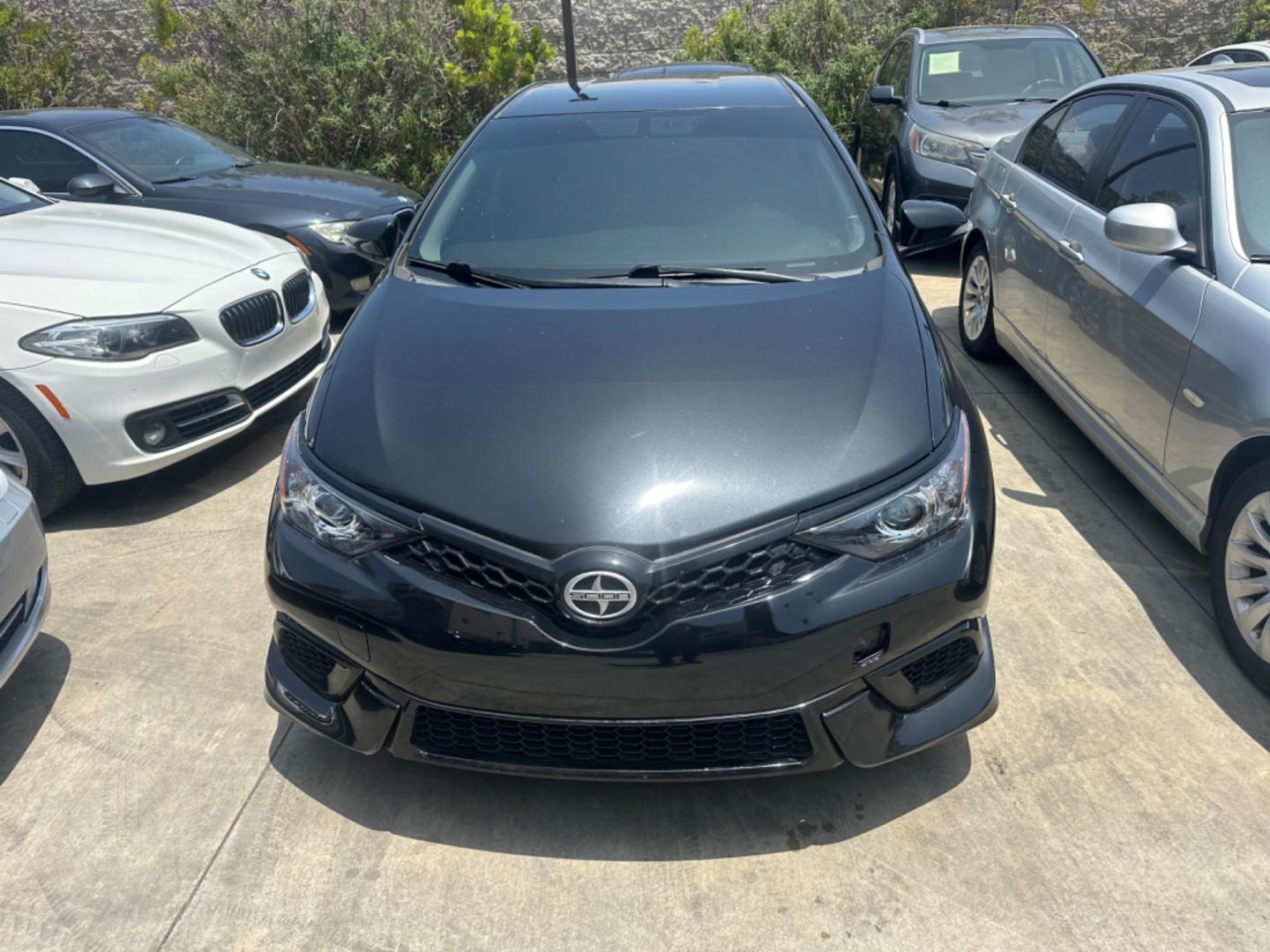 2016 Black /Black Scion iM Cloth (JTNKARJE7GJ) with an 1.8 4 Cylinder engine, Automatic transmission, located at 30 S. Berkeley Avenue, Pasadena, CA, 91107, (626) 248-7567, 34.145447, -118.109398 - 2016 Scion iM 1.8: Your Ideal Pre-Owned Hatchback in Pasadena, CA When searching for used BHPH cars in Pasadena, CA, the 2016 Scion iM 1.8 stands out as a premier choice. This versatile hatchback combines efficiency, style, and practicality, making it a highly sought-after vehicle in the pre-owned - Photo#17